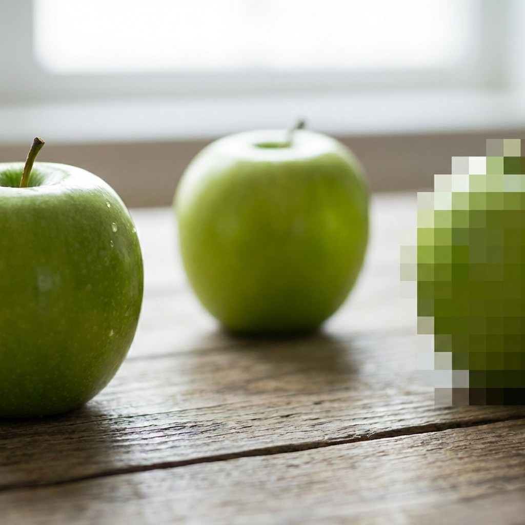 3 green apples. One is clear, one is out of focus and one is pixelated.